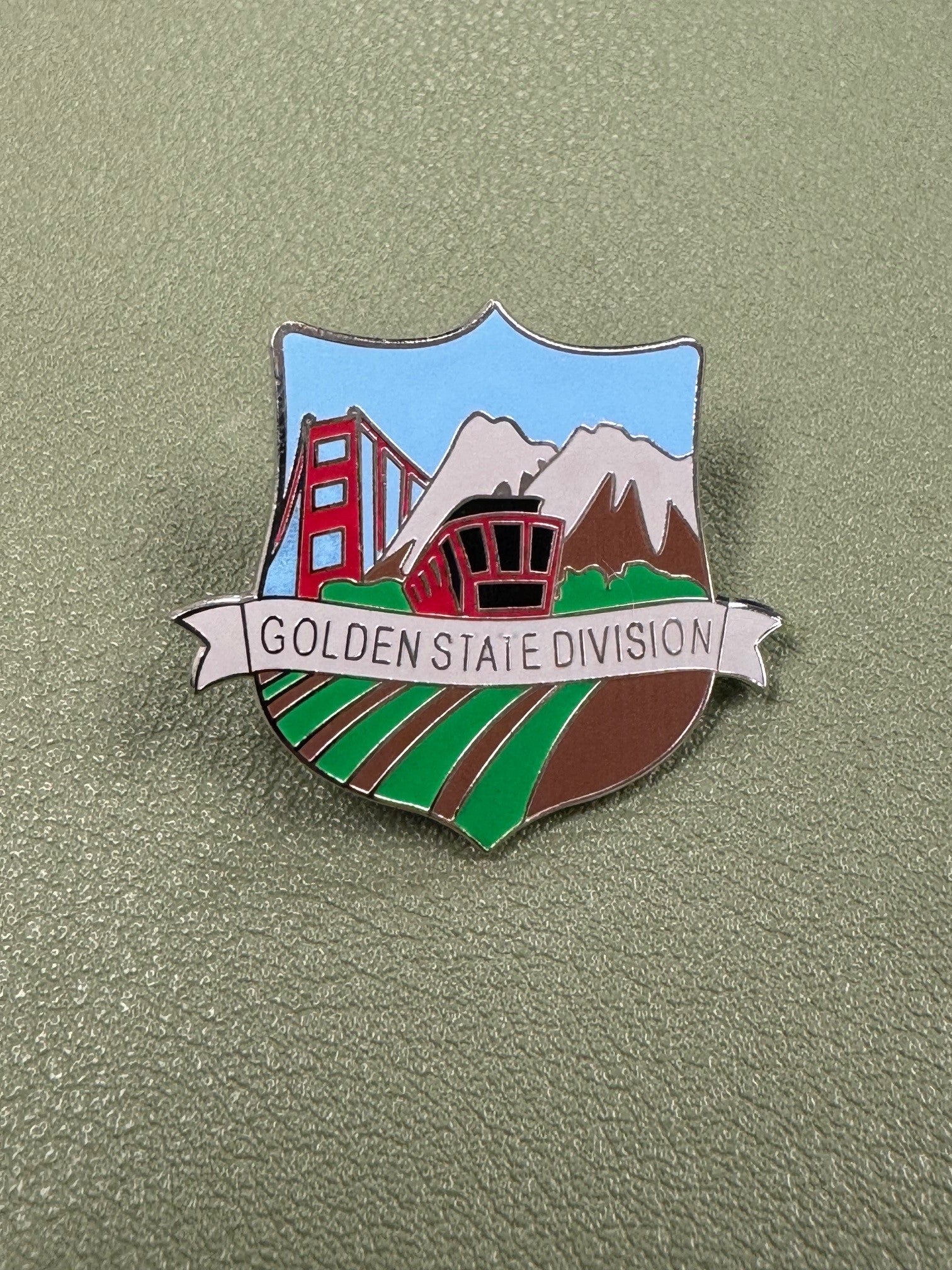 Set of 11 Division Pins (includes vintage "Sierra Del Mar" pin)